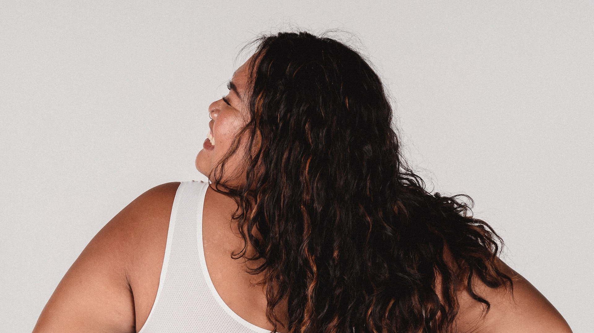 plus size woman in white swim tops